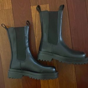 Black slip on combat boots